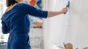 A Woman Painting on a Canvas