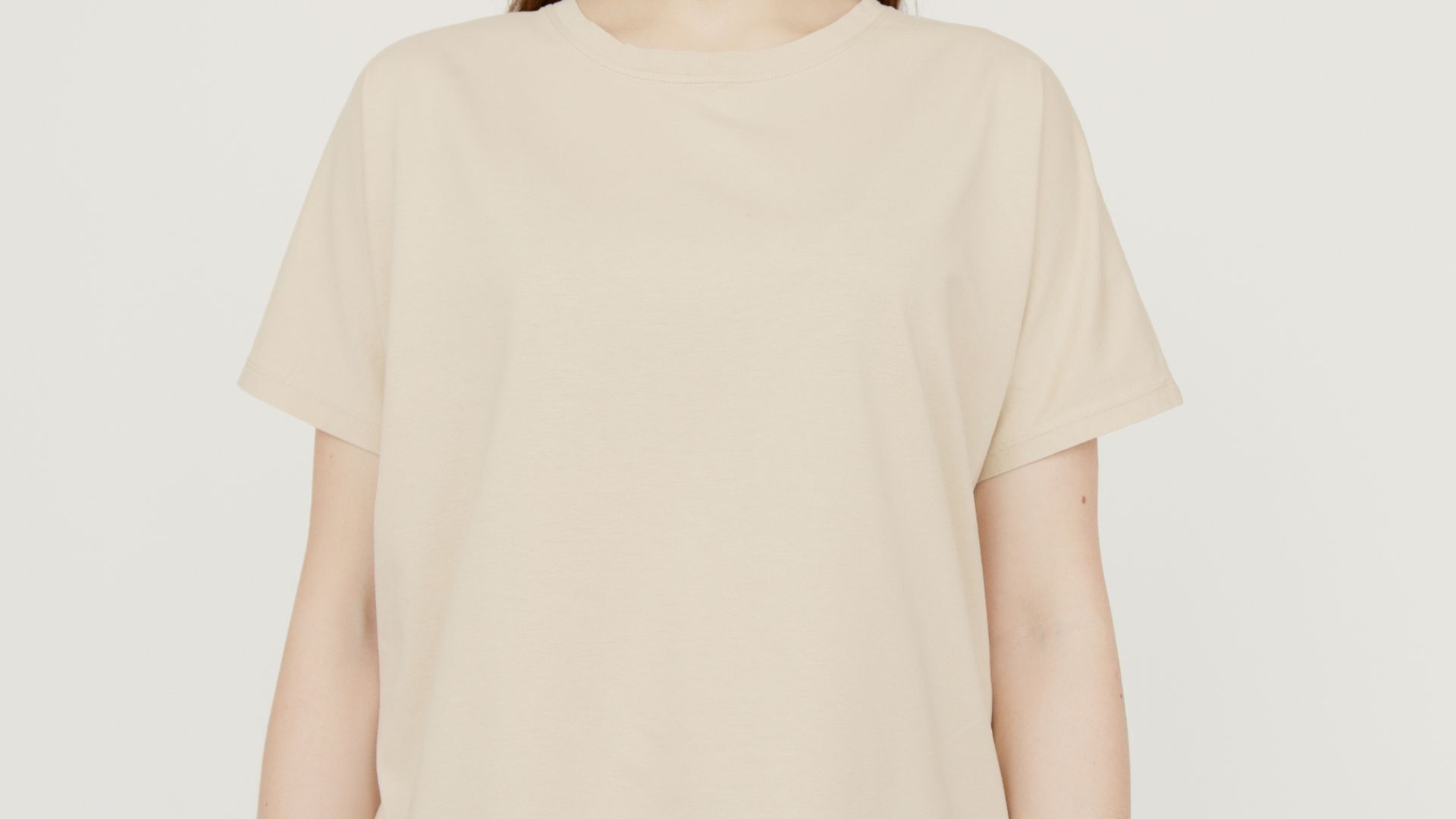A Woman Wearing Plain Brown Shirt