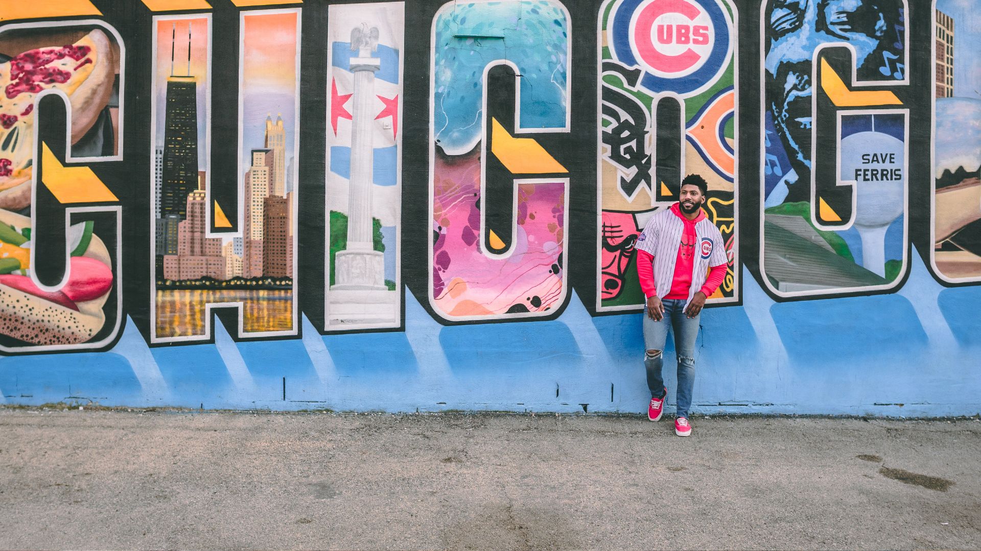 Man Posing By Street Art