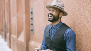 Man Wearing Black Vest and Blue Denim Shirt m