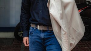 Man in Black Button Up Dress Shirt and Blue Denim Jeans