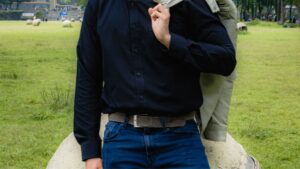 Man in Dress Shirt and Denim Jeans