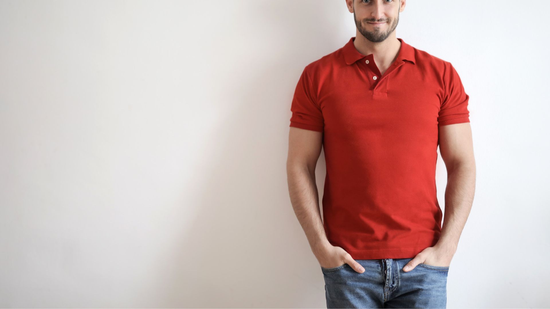 Man in Red Polo Shirt and Blue Denim Jeans