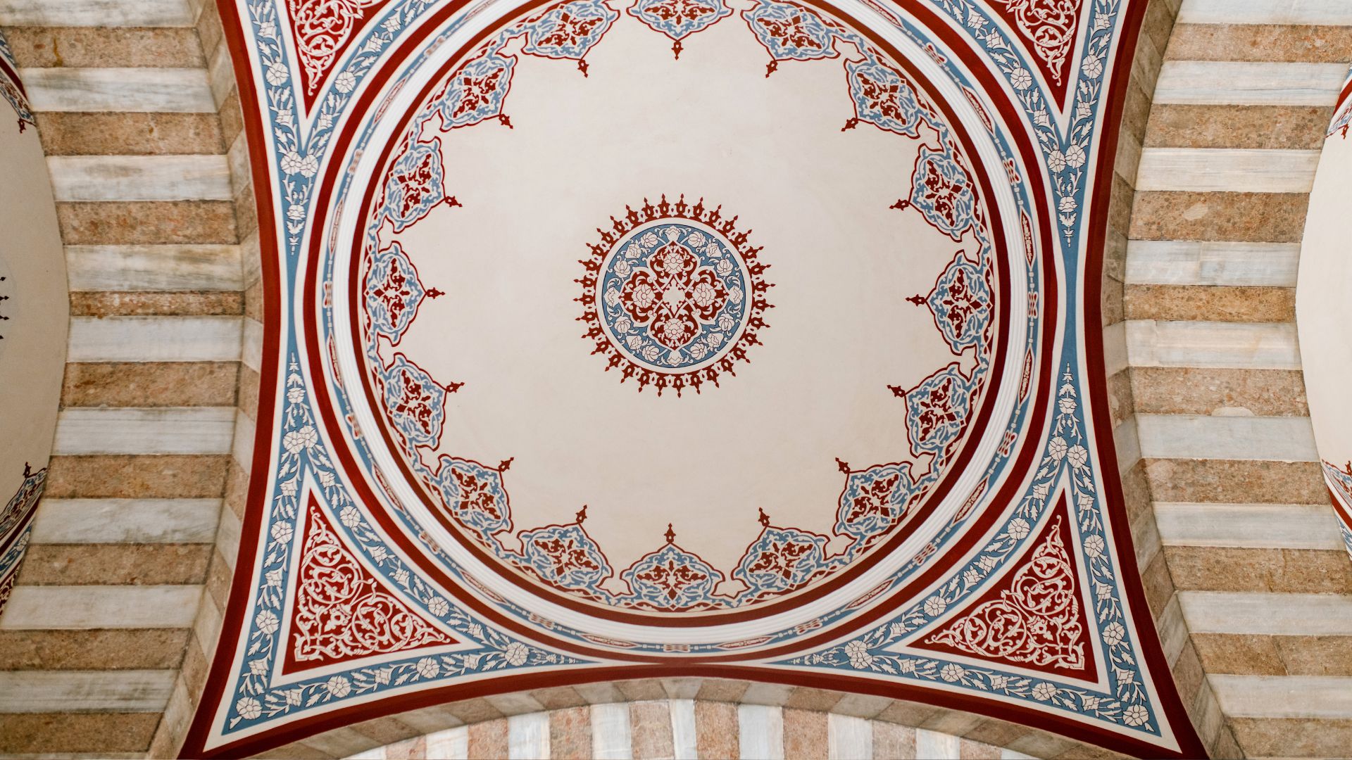 Ornamental ceiling with colorful oriental mural in mosque