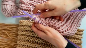 Person Crocheting Yarn