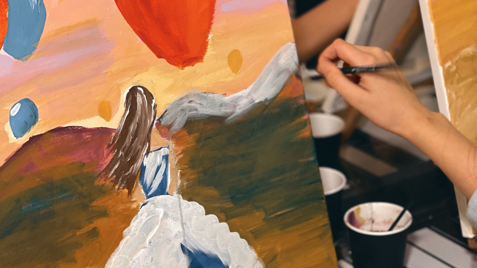 Person Doing A Painting Of A Girl