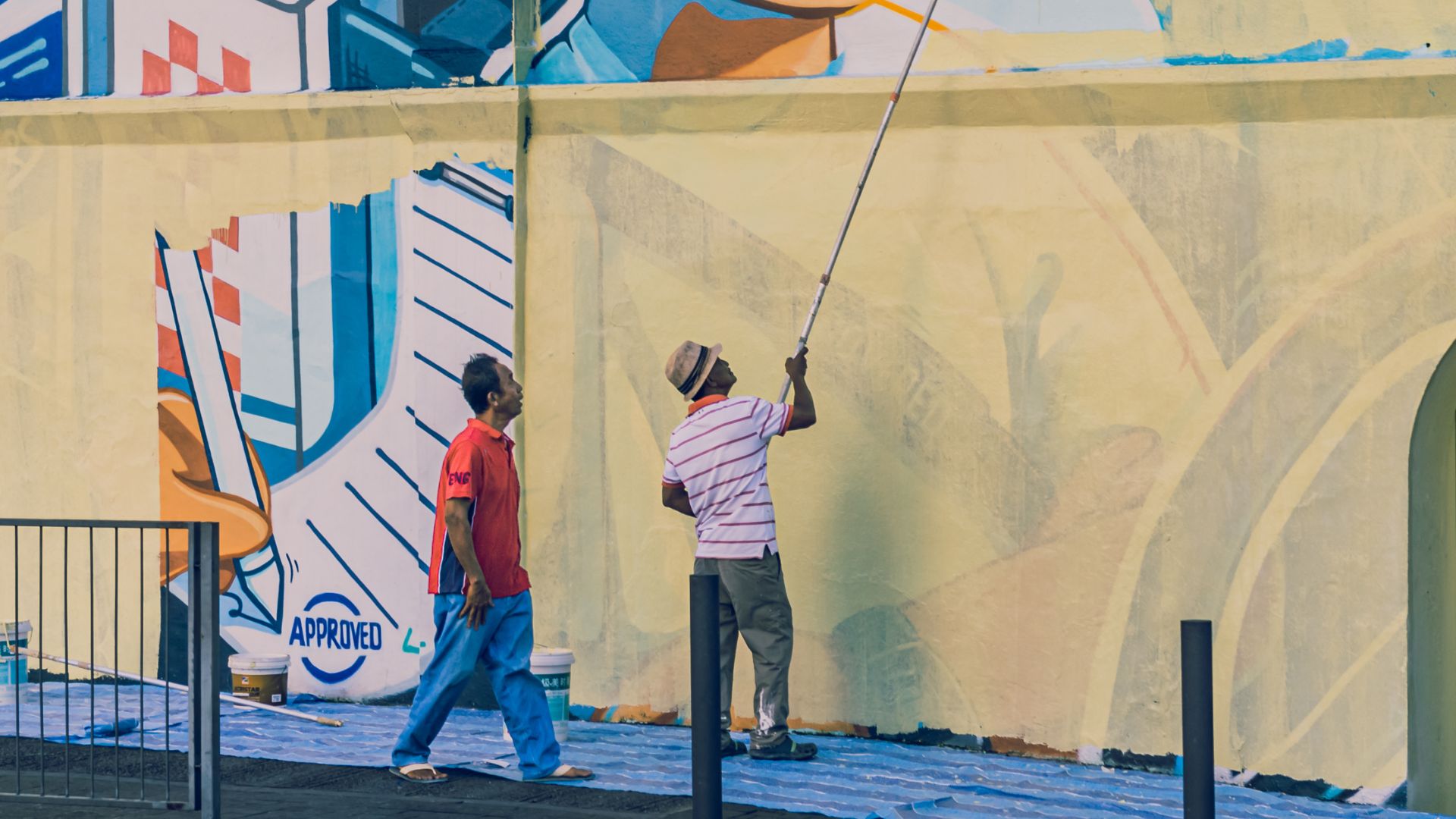 Person Painting The Wall(o