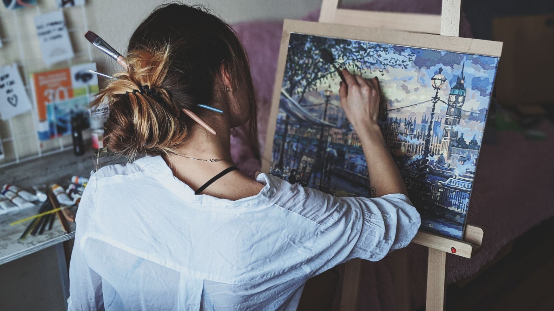 Photo Of Woman In Front Of Painting