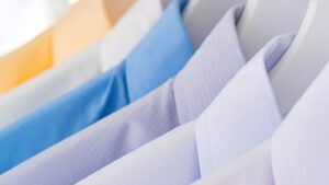 Set of formal shirts for men on hangers in shop